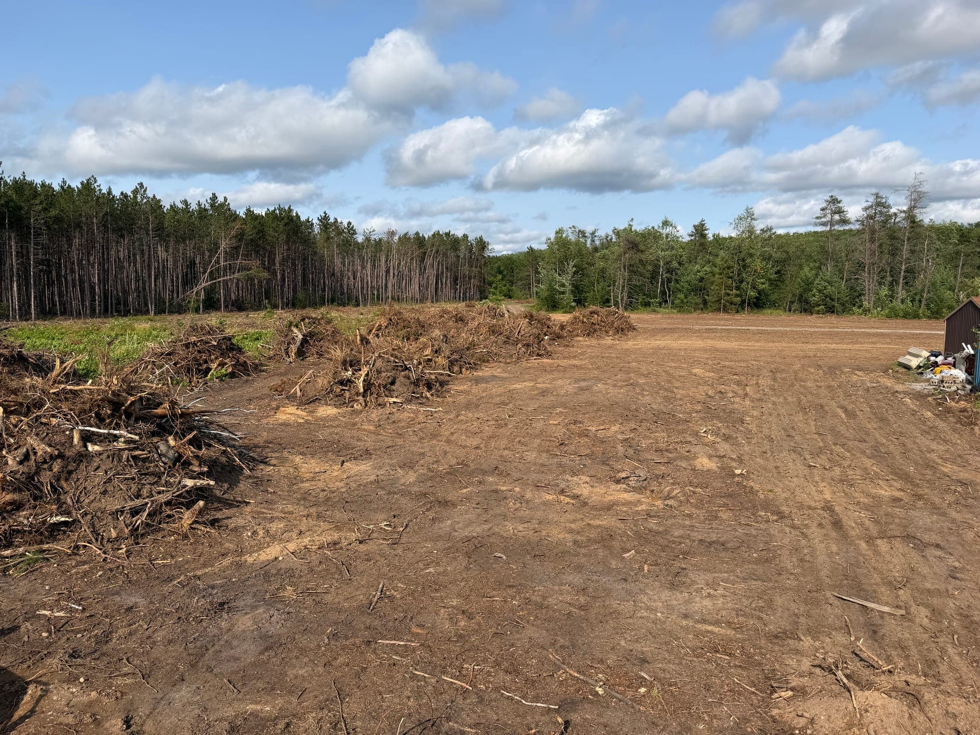Wide finished clearing with clean access and graded ground