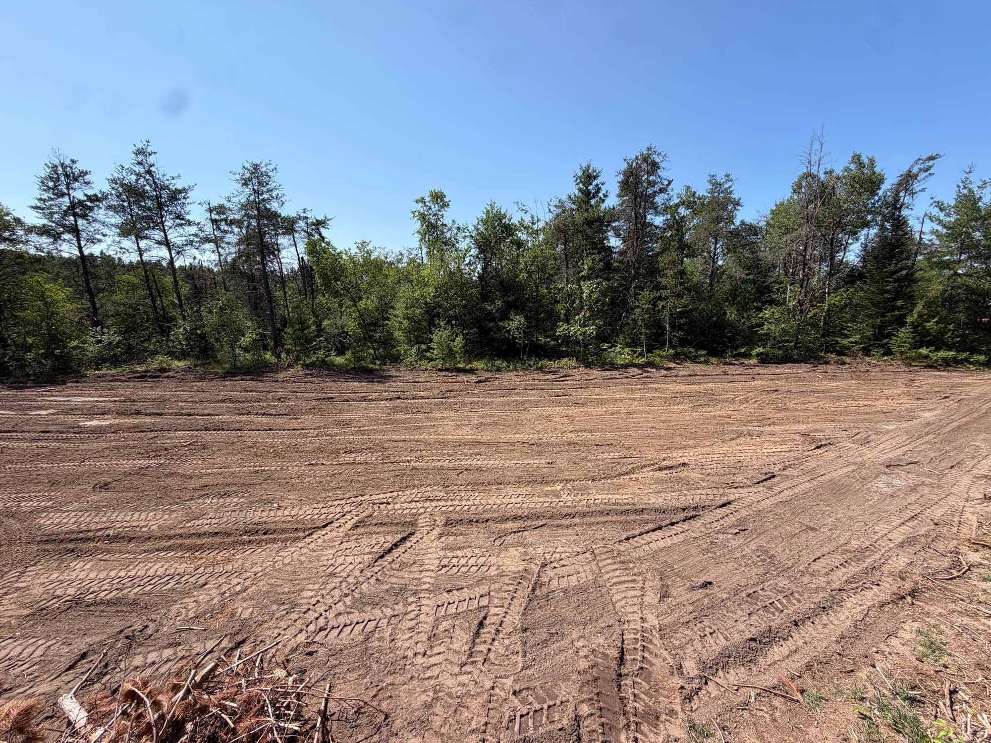 Finished grading across newly cleared northern Michigan land